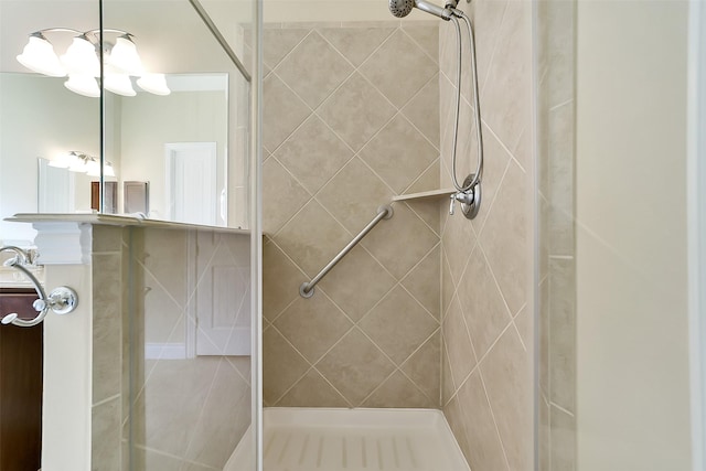 2106 Wild Peregrine Cir, Katy, TX 77494 - full bath featuring a tile shower, a chandelier, and vanity