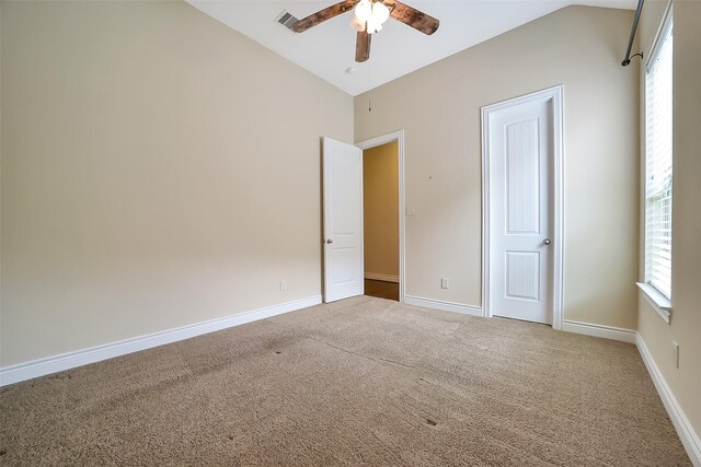 2106 Wild Peregrine Cir, Katy, TX 77494 - unfurnished bedroom with lofted ceiling, carpet floors, and ceiling fan