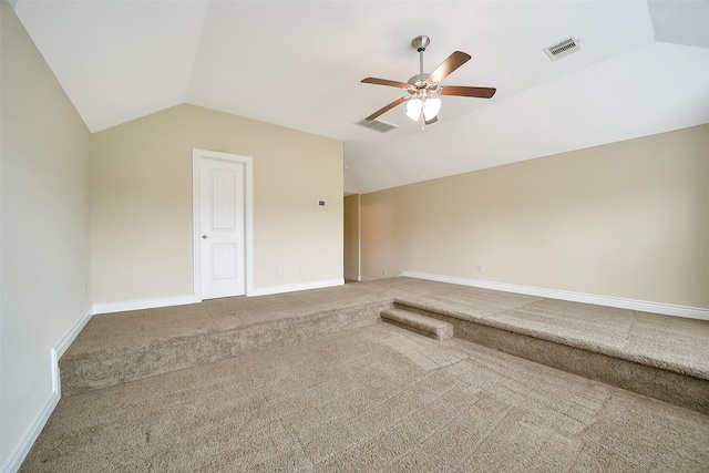 2106 Wild Peregrine Cir, Katy, TX 77494 - carpeted spare room with lofted ceiling and a ceiling fan