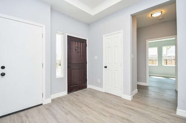 10322 Rancho Bernardo Ln, Sugar Land, TX 77498 - entryway featuring baseboards and light wood-style floors