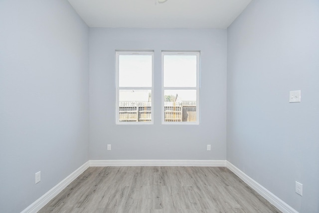10322 Rancho Bernardo Ln, Sugar Land, TX 77498 - unfurnished room featuring baseboards and light wood-style floors