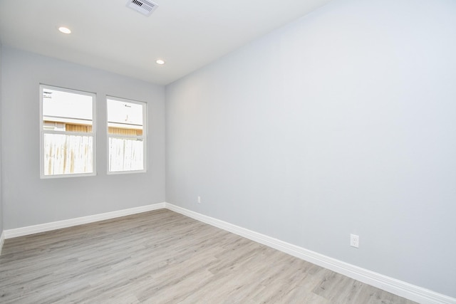 10322 Rancho Bernardo Ln, Sugar Land, TX 77498 - spare room featuring baseboards, recessed lighting, light wood-style flooring, and visible vents