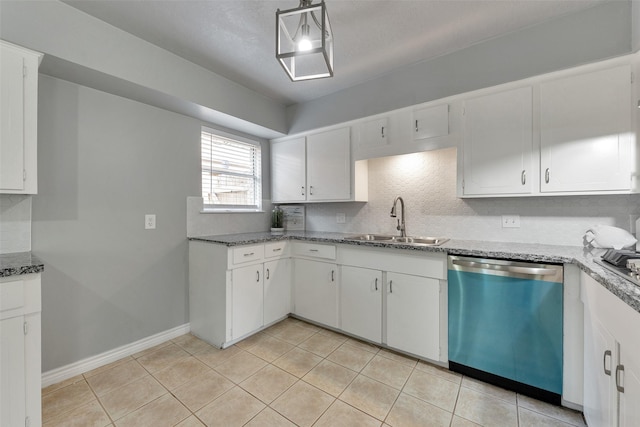 1865 El Mar Ln, Seabrook, TX 77586 - kitchen featuring dishwasher, a sink, stone countertops, and baseboards