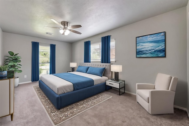 1865 El Mar Ln, Seabrook, TX 77586 - bedroom with carpet, baseboards, and a ceiling fan