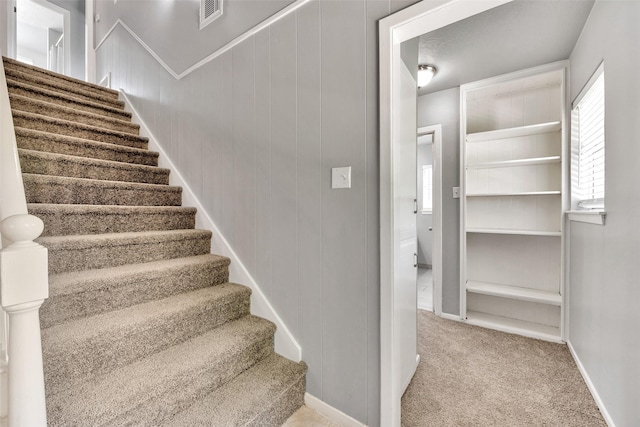 1865 El Mar Ln, Seabrook, TX 77586 - staircase featuring baseboards and carpet flooring