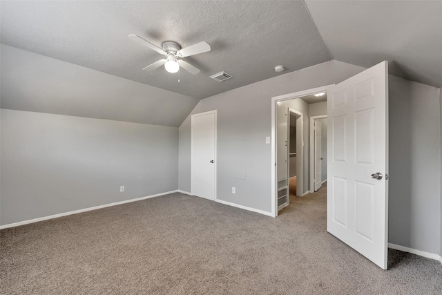 1865 El Mar Ln, Seabrook, TX 77586 - bonus room with ceiling fan, carpet floors, lofted ceiling, baseboards, and a textured ceiling