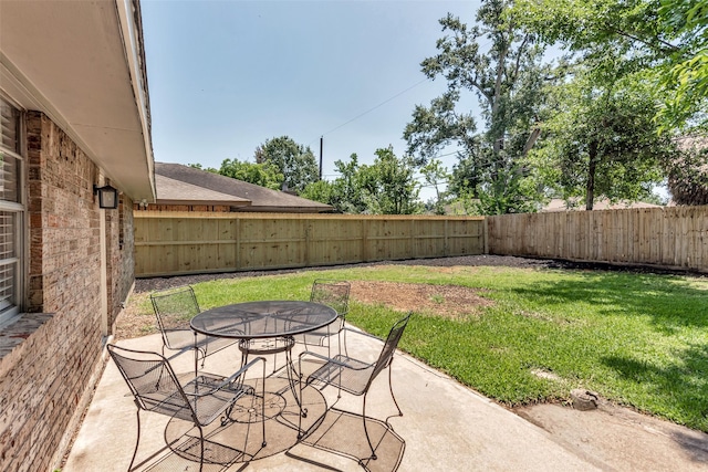 1865 El Mar Ln, Seabrook, TX 77586 - view of patio / terrace featuring outdoor dining area