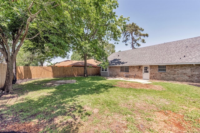 1865 El Mar Ln, Seabrook, TX 77586 - view of yard featuring a patio area
