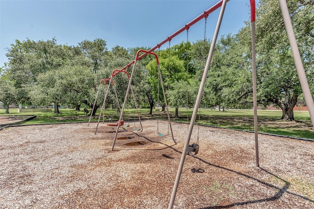 1865 El Mar Ln, Seabrook, TX 77586 - communal playground with view of wooded area