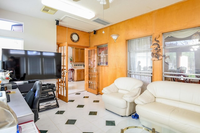 3222 Mossy Elm Ct, Houston, TX 77059 - home office with attic access, light tile patterned floors, and ceiling fan