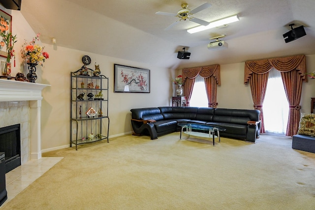 3222 Mossy Elm Ct, Houston, TX 77059 - carpeted living area featuring a ceiling fan, a premium fireplace, and lofted ceiling