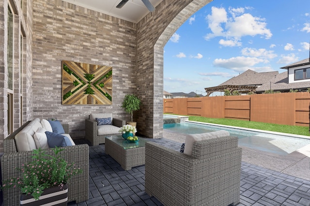 view of patio with a fenced in pool, ceiling fan, an outdoor hangout area, an in ground hot tub, and a fenced backyard