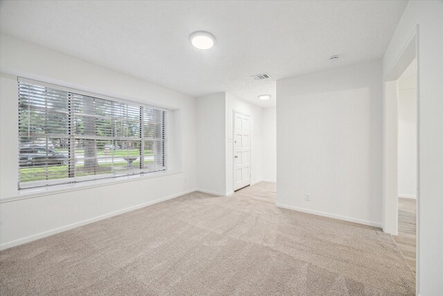 2435 Cypresstree Dr, Spring, TX 77373 - carpeted empty room featuring baseboards and a smoke detector