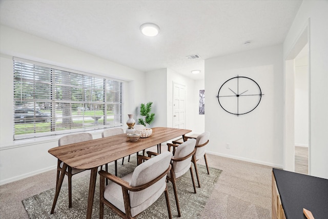2435 Cypresstree Dr, Spring, TX 77373 - dining area featuring light colored carpet