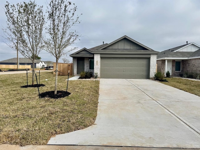 ranch-style house with board and batten siding, brick siding, an attached garage, concrete driveway, and a front lawn