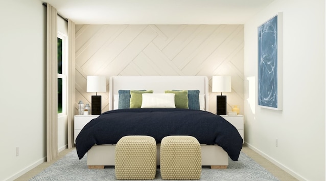 bedroom with baseboards and carpet floors