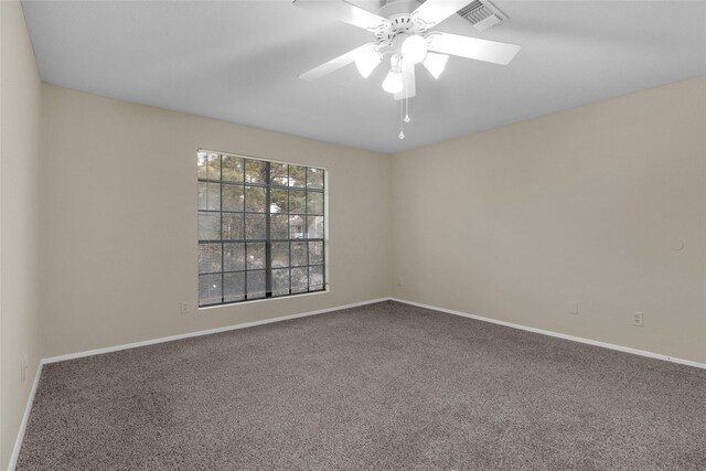 14911 Wunderlich Dr Unit 609, Houston, TX 77069 - spare room featuring carpet flooring, baseboards, a ceiling fan, and visible vents