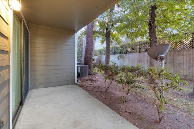 14911 Wunderlich Dr Unit 609, Houston, TX 77069 - view of patio featuring central AC unit and fence