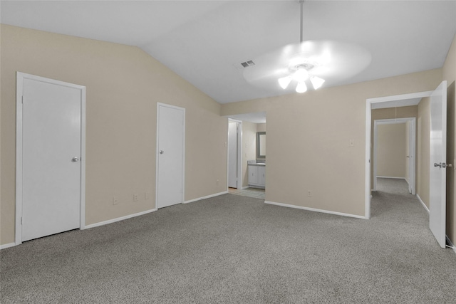 14911 Wunderlich Dr Unit 609, Houston, TX 77069 - unfurnished living room with lofted ceiling, carpet flooring, visible vents, and baseboards