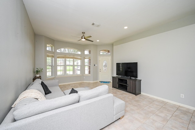 21111 Diamond Rock Ct, Katy, TX 77449 - living room featuring ceiling fan, light tile patterned floors, baseboards, and recessed lighting