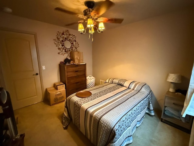 bedroom featuring carpet and a ceiling fan
