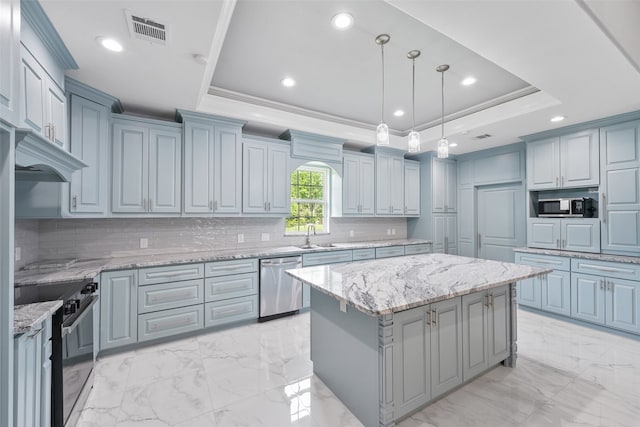 kitchen with visible vents, dishwasher, crown molding, a tray ceiling, and range with electric cooktop