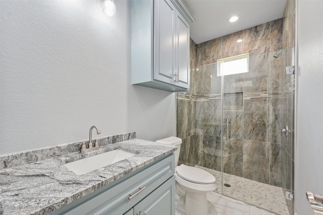 full bath featuring recessed lighting, toilet, marble finish floor, vanity, and a marble finish shower