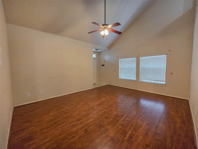 unfurnished room featuring high vaulted ceiling, dark wood-style flooring, baseboards, and ceiling fan