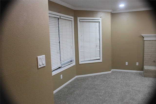 unfurnished living room featuring baseboards, recessed lighting, crown molding, and carpet