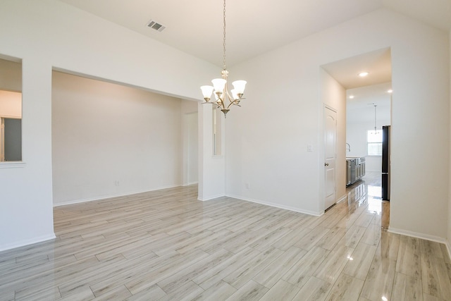 7634 Wrightwood Dr, Pasadena, TX 77505 - empty room featuring visible vents, recessed lighting, light wood finished floors, a chandelier, and baseboards