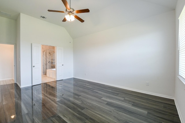 7634 Wrightwood Dr, Pasadena, TX 77505 - unfurnished bedroom with baseboards, dark wood-type flooring, visible vents, and vaulted ceiling