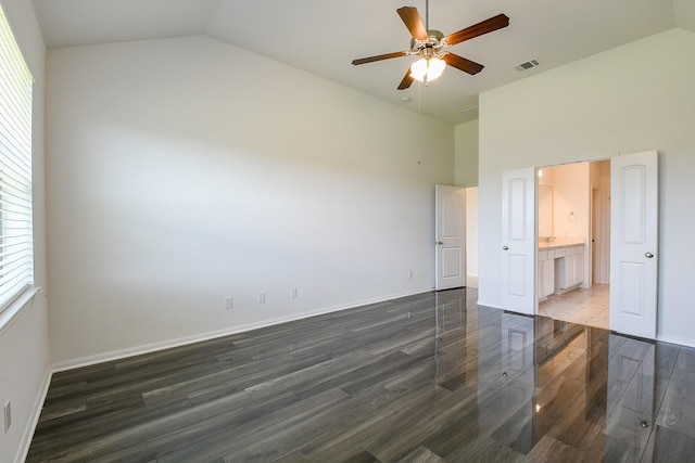 7634 Wrightwood Dr, Pasadena, TX 77505 - unfurnished bedroom with ensuite bath, high vaulted ceiling, visible vents, dark wood finished floors, and baseboards