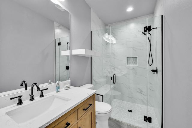 215 Carey Dr, Brenham, TX 77833 - bathroom with toilet, vanity, recessed lighting, and a marble finish shower