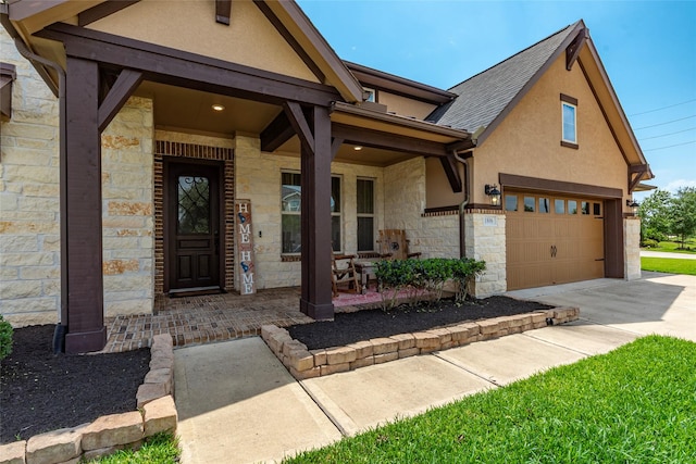 1806 Bridge Gate Ln, Katy, TX 77494 - craftsman inspired home with covered porch, concrete driveway, stucco siding, and stone siding