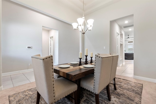 1806 Bridge Gate Ln, Katy, TX 77494 - dining area featuring light tile patterned floors, baseboards, visible vents, and ceiling fan with notable chandelier