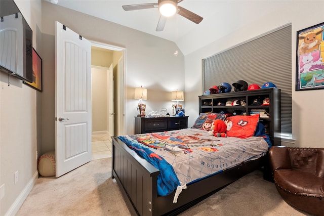 1806 Bridge Gate Ln, Katy, TX 77494 - bedroom featuring lofted ceiling, baseboards, a ceiling fan, and light colored carpet