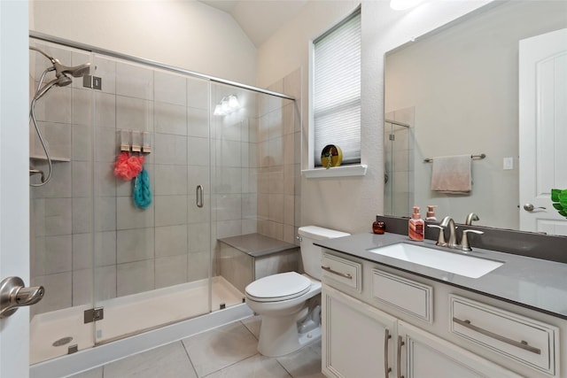 1806 Bridge Gate Ln, Katy, TX 77494 - bathroom with vanity, toilet, a shower stall, and tile patterned floors