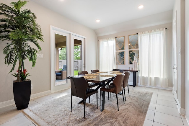 1806 Bridge Gate Ln, Katy, TX 77494 - dining area featuring baseboards, light tile patterned floors, and recessed lighting