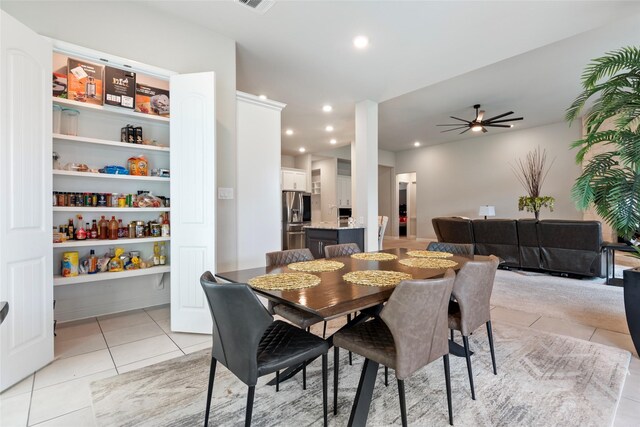 1806 Bridge Gate Ln, Katy, TX 77494 - dining area featuring light tile patterned floors, recessed lighting, and ceiling fan
