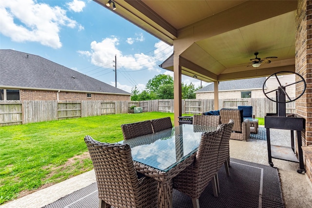 1806 Bridge Gate Ln, Katy, TX 77494 - view of patio / terrace featuring a fenced backyard, outdoor dining space, and a ceiling fan