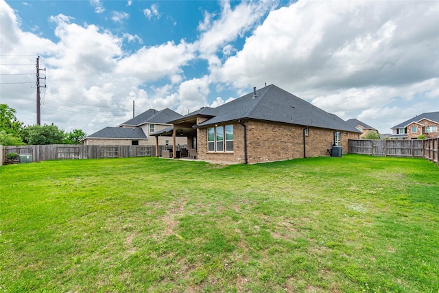 1806 Bridge Gate Ln, Katy, TX 77494 - view of yard featuring a patio and a fenced backyard
