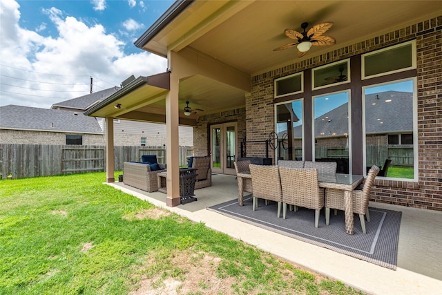 1806 Bridge Gate Ln, Katy, TX 77494 - view of patio featuring a ceiling fan, an outdoor living space, and a fenced backyard