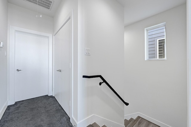 3313 Baer St, Houston, TX 77020 - stairway featuring baseboards