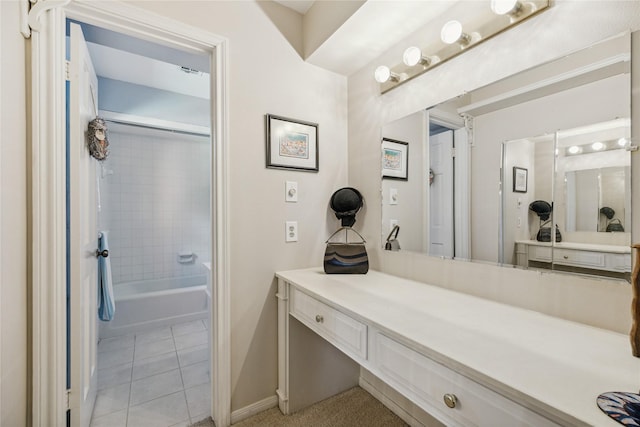 2002 Anvil Dr, Houston, TX 77090 - full bathroom featuring vanity, tile patterned flooring, baseboards, and shower / washtub combination