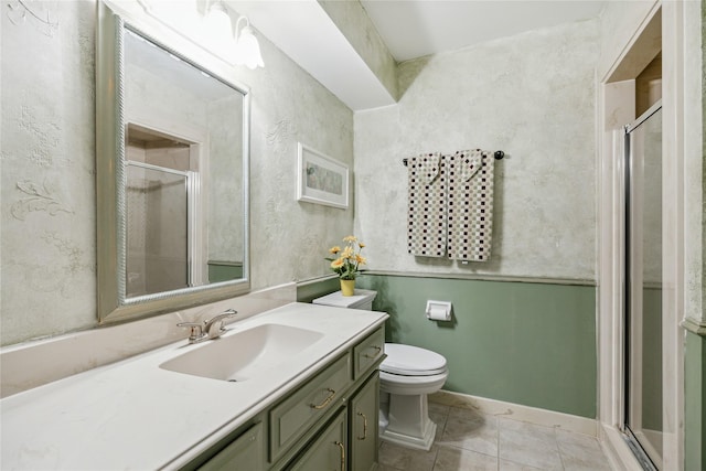 2002 Anvil Dr, Houston, TX 77090 - bathroom with vanity, a stall shower, toilet, and tile patterned floors