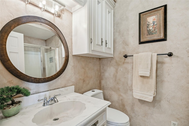 2002 Anvil Dr, Houston, TX 77090 - full bathroom featuring toilet, a shower stall, vanity, and a textured wall