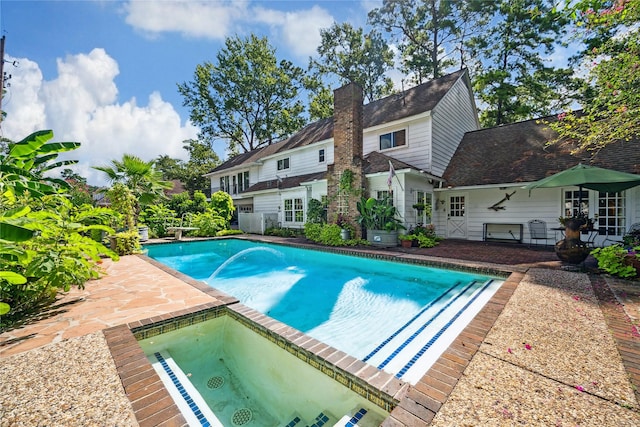 2002 Anvil Dr, Houston, TX 77090 - outdoor pool with a patio area and an in-ground hot tub