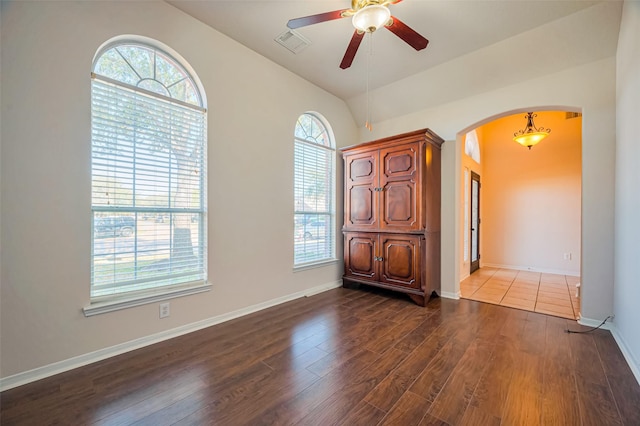 2107 Auburn Vale St, Katy, TX 77493 - empty room featuring arched walkways, a healthy amount of sunlight, visible vents, and a ceiling fan