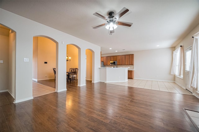 2107 Auburn Vale St, Katy, TX 77493 - unfurnished living room featuring ceiling fan, light wood-style flooring, and recessed lighting