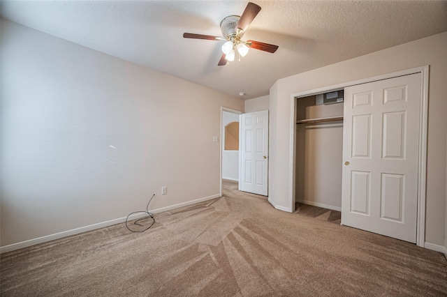2107 Auburn Vale St, Katy, TX 77493 - unfurnished bedroom with baseboards, carpet flooring, a closet, and ceiling fan